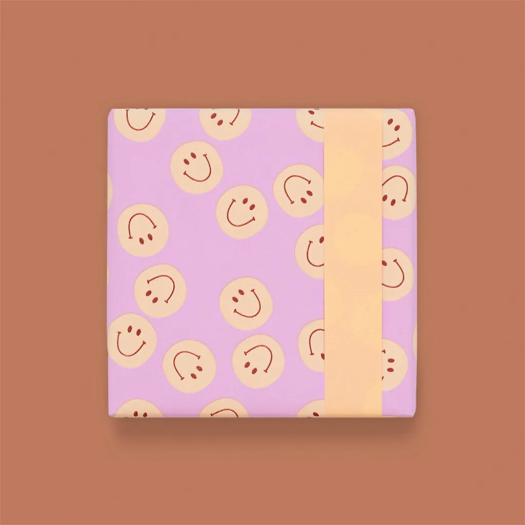 Geschenkverpackung, Geschenkbox, Lila Muster, Geschenkband, Smiley-Muster